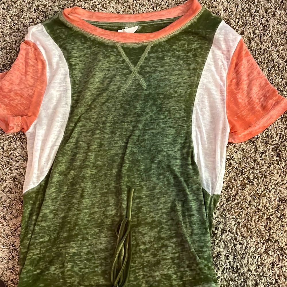 The brand of this shirt is NOBO and it is a woman’s small